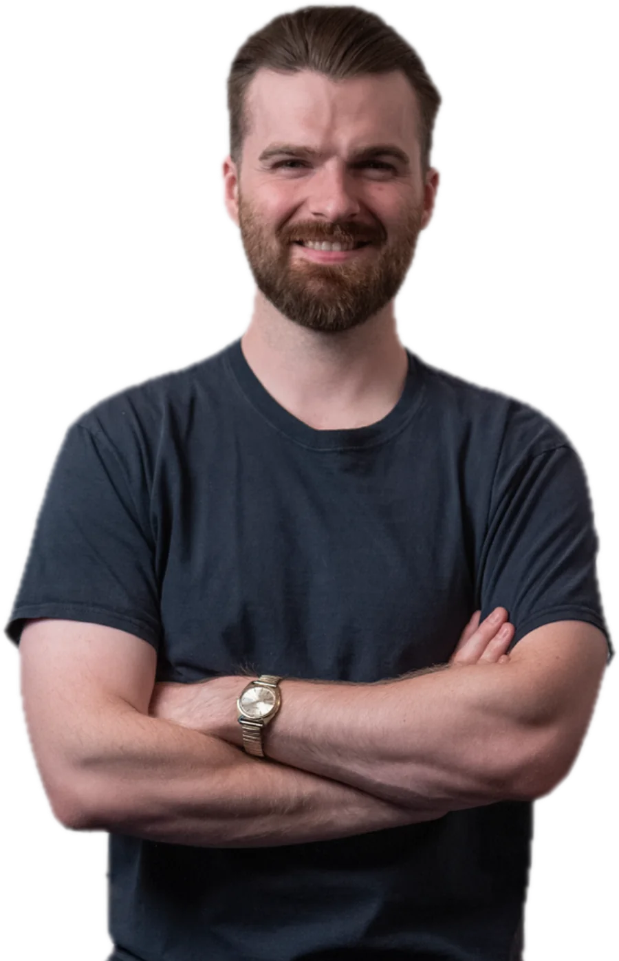 Stephen Gay, smiling, arms crossed, in a navy T-shirt.